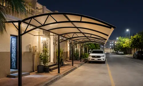 Steel parking shade structure installed in an outdoor area as part of covered parking structures in Saudi Arabia.