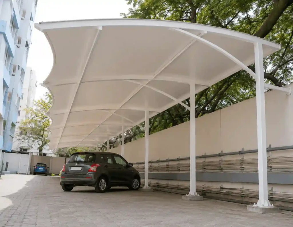 Covered residential parking shades in Riyadh for villa parking.