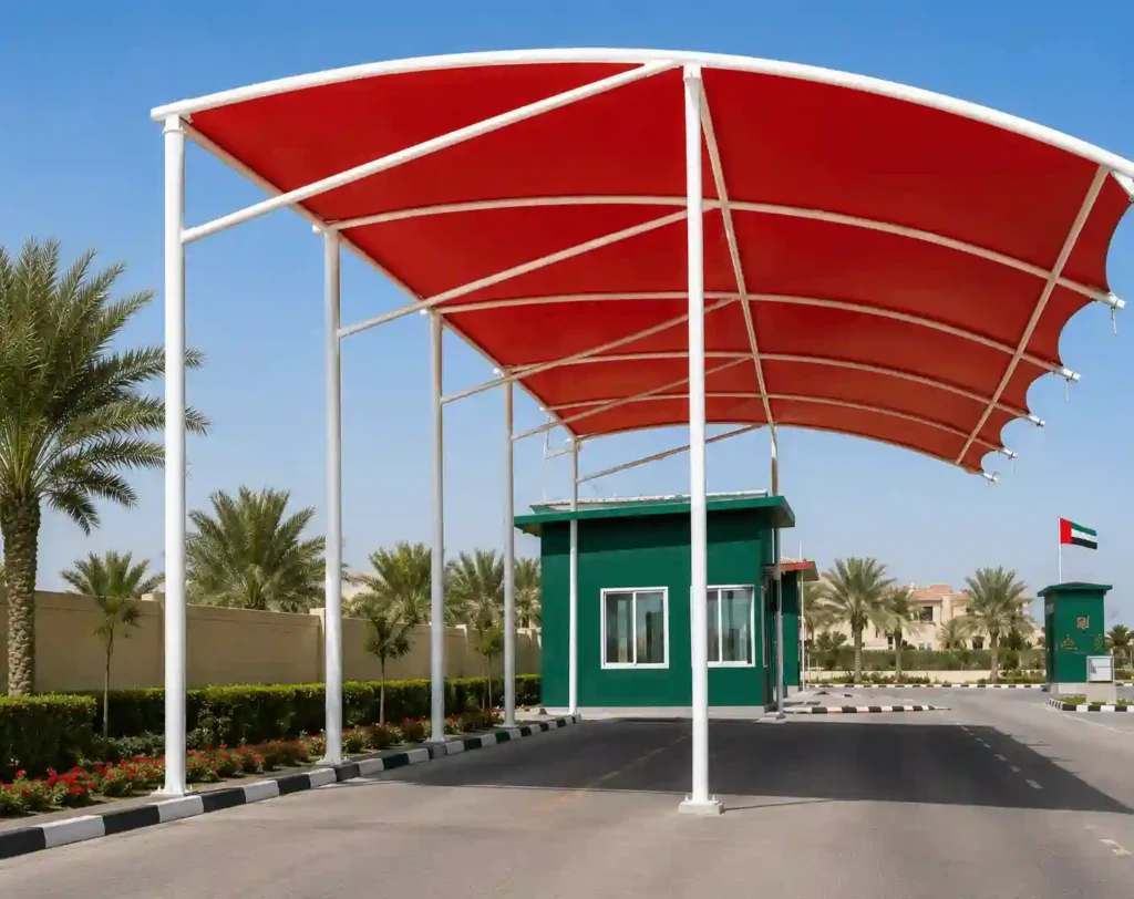 Red entrance canopy shade covering vehicle access area.