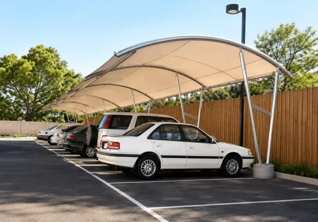 Residential car parking canopy protecting vehicles from sunlight.