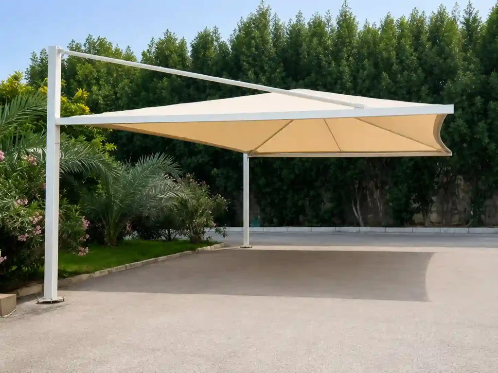 Modern cantilever car parking shade installed for outdoor vehicle protection, representing professional car parking shade installation in Saudi Arabia.
