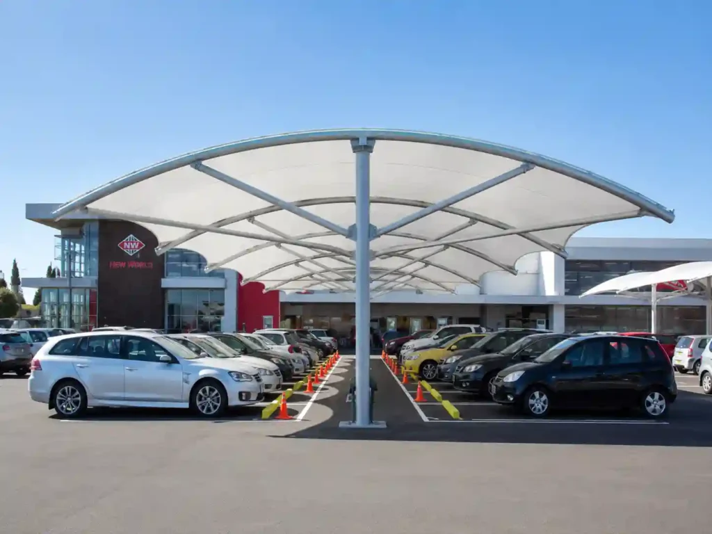 Double-span parking shade for large parking areas.