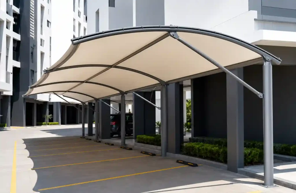 Multi-bay tensile structure for parking shade installation in Riyadh.
