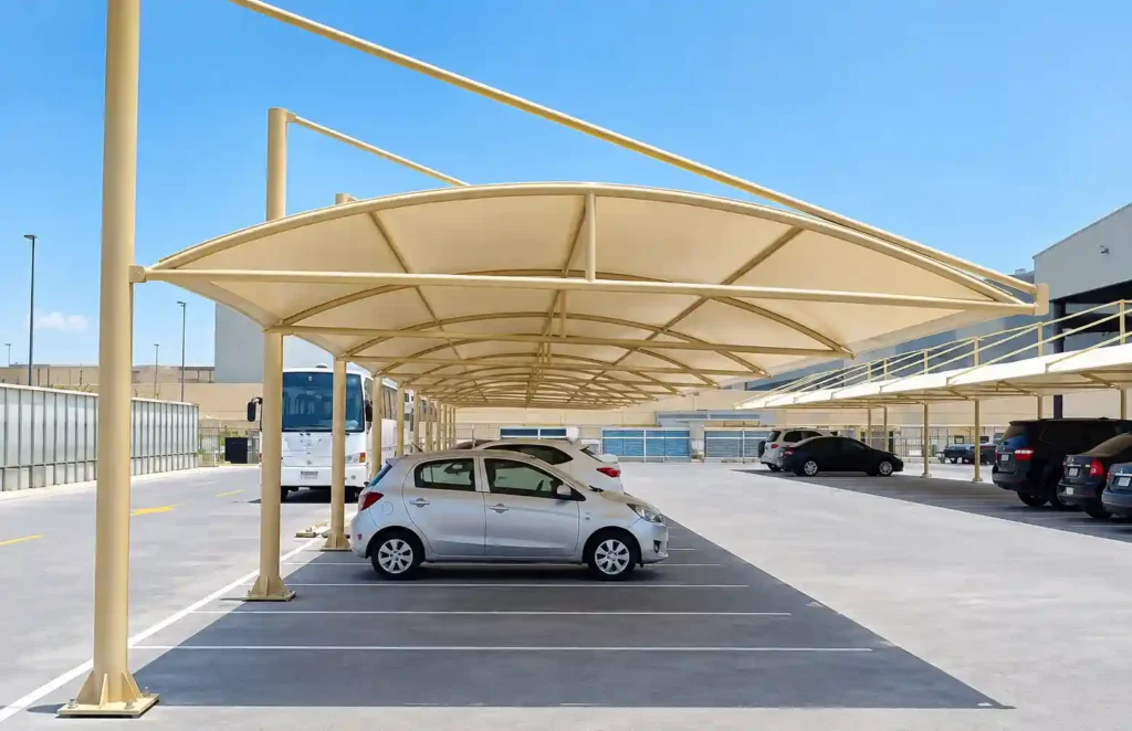 Multi-car parking shade structure installed for outdoor vehicle protection.