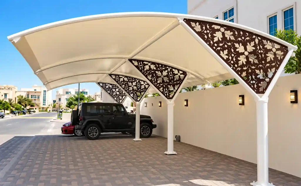 Decorative shade structure with patterned support design.